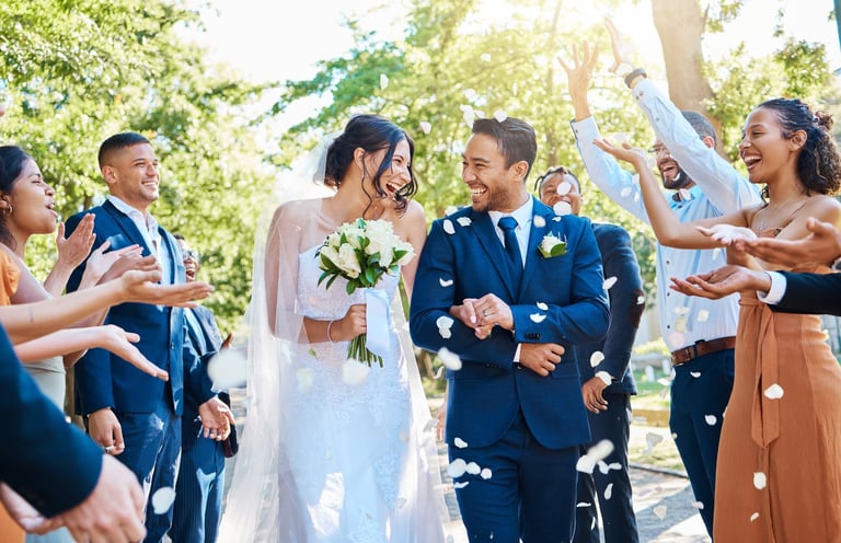 Wedding guests throwing rose petals and confetti over bride and groom on their special day — Wedding Fun Studio interactive games and tools by Royal Wedding Cinema Tanzania