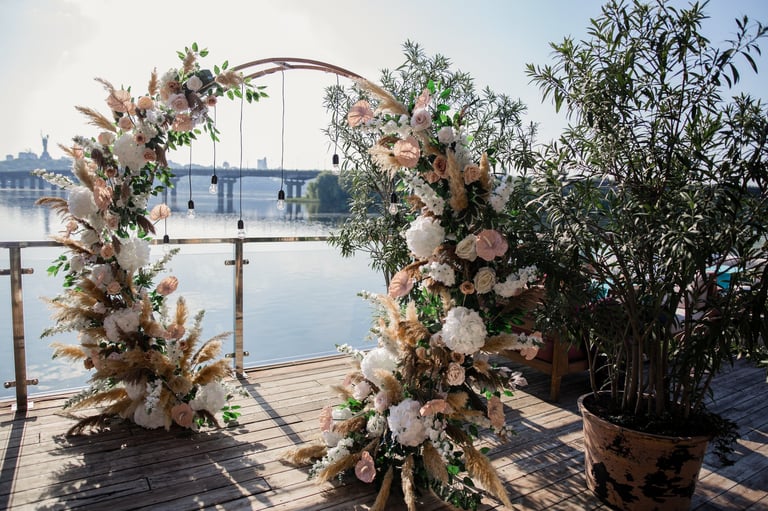 Large beautiful wedding arch lakeside ceremony at Jakobsen Beach Kigoma Lake Tanganyika