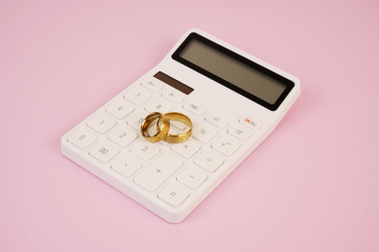 Cost of wedding concept with golden wedding rings and calculator on pink background — Budget Planner Tool for Tanzanian couples by Royal Wedding Cinema