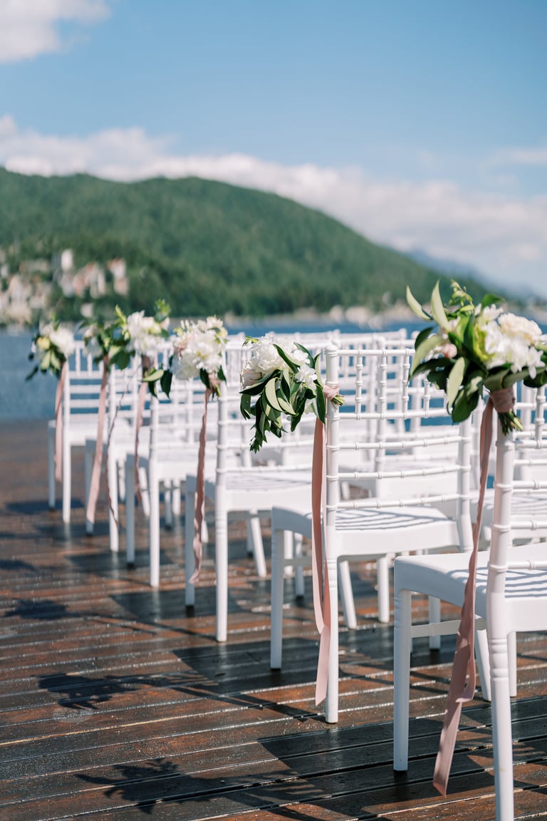 Lakeside wedding aisle at Kigoma Hilltop Hotel with views over Lake Tanganyika and Congolese mountains
