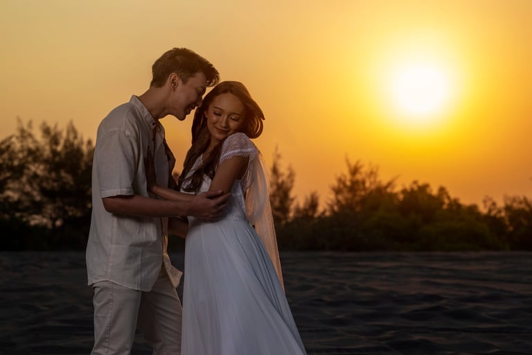 Happy couple in beach wedding setting at Katonga Private Estate Kigoma Lake Tanganyika golden sunset