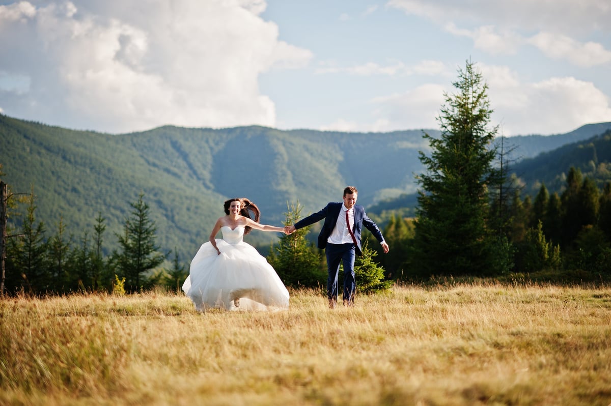 Lovely wedding couple at amazing mountain landscapes near Moshi Kilimanjaro