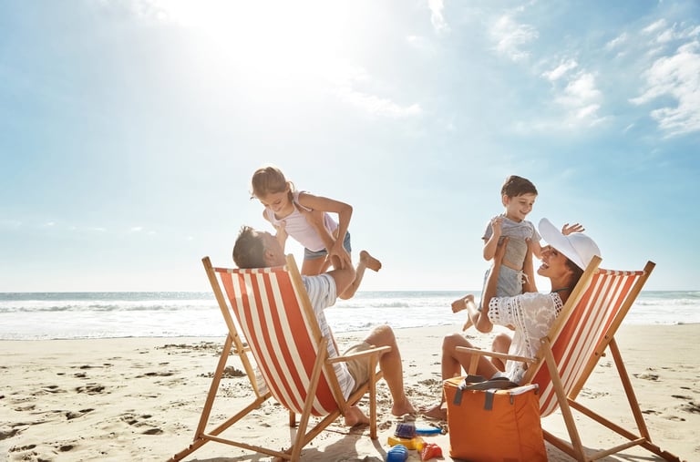 A family enjoying quality time together at the beach