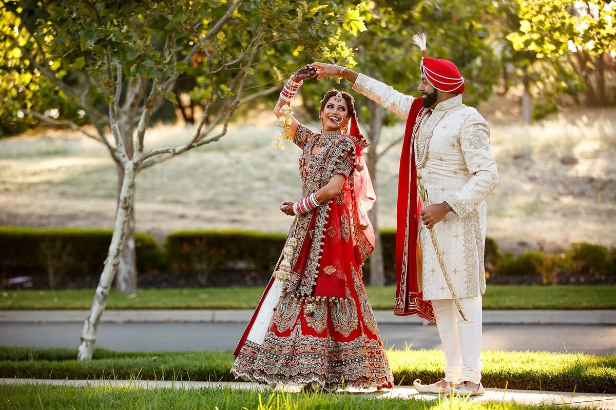 Indian bride and groom in traditional wedding attire at a luxury Zanzibar destination wedding photographed by Royal Wedding Cinema & Photography Tanzania